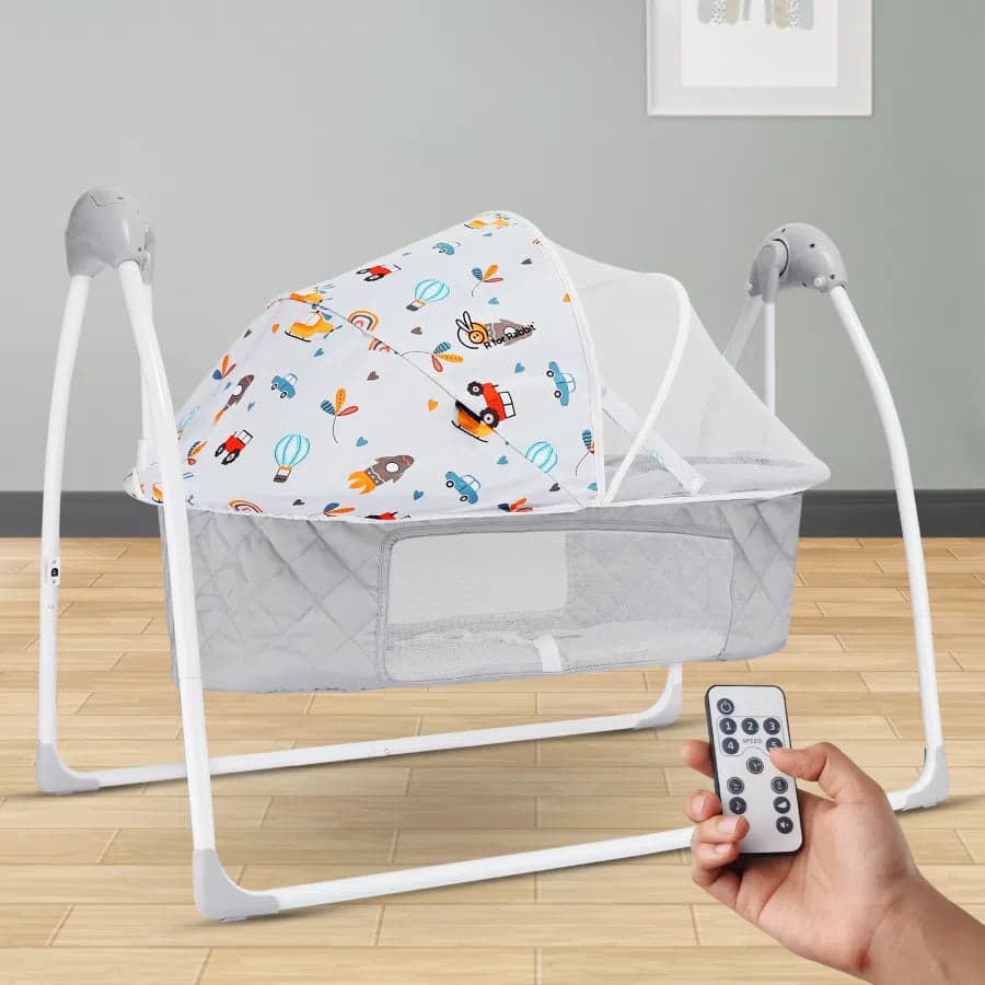 Automatic baby swing with mosquito net and toys